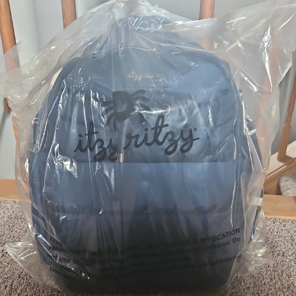Itzy Ritzy Blue Backpack with Soft Fabric and Rounded Design